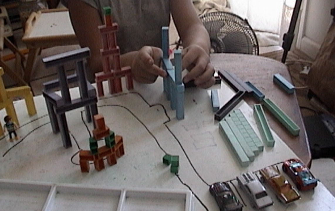 math town, brooklyn builds with base ten blocks, base ten block towers, multiplication